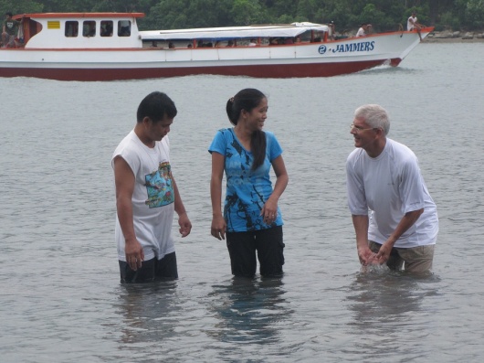Joking with Ruth before her baptism as a passenger boat passes by in the background. Ruth is the daughter of one of our up and coming leaders, Cesar.  She also assists with our radio ministry.