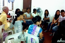 Talking with students after one of the first services.